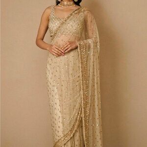 Elegant Gold Embellished Saree